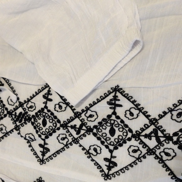 NYCC Semi-transparent white blouse with black embroidery on the front. - Picture 4 of 10